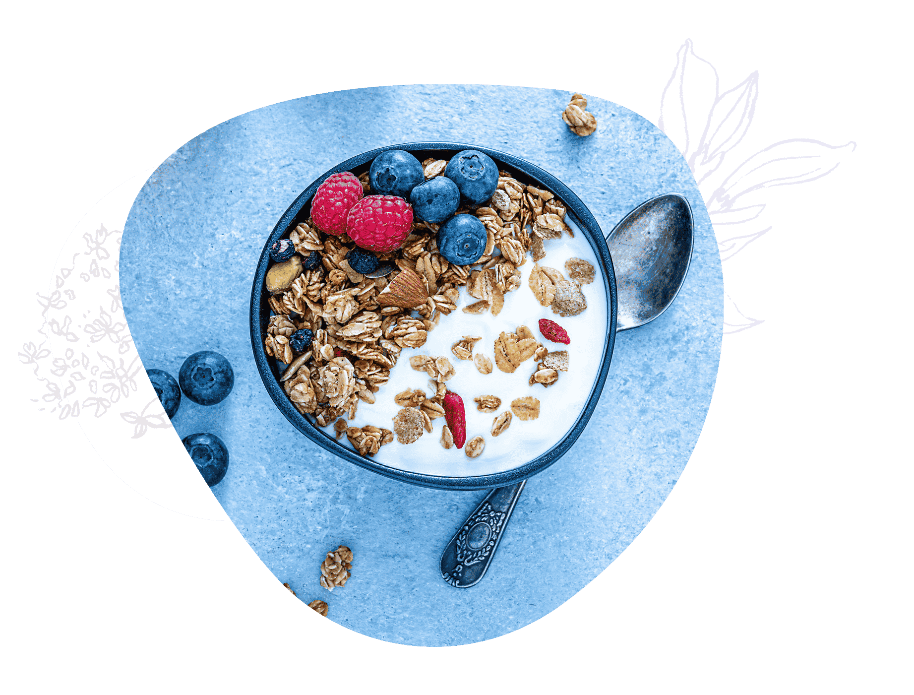 Frühstücksschale mit Müsli, Beeren und Milch